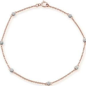 .10ct 14kt rose gold diamond by yard station brace